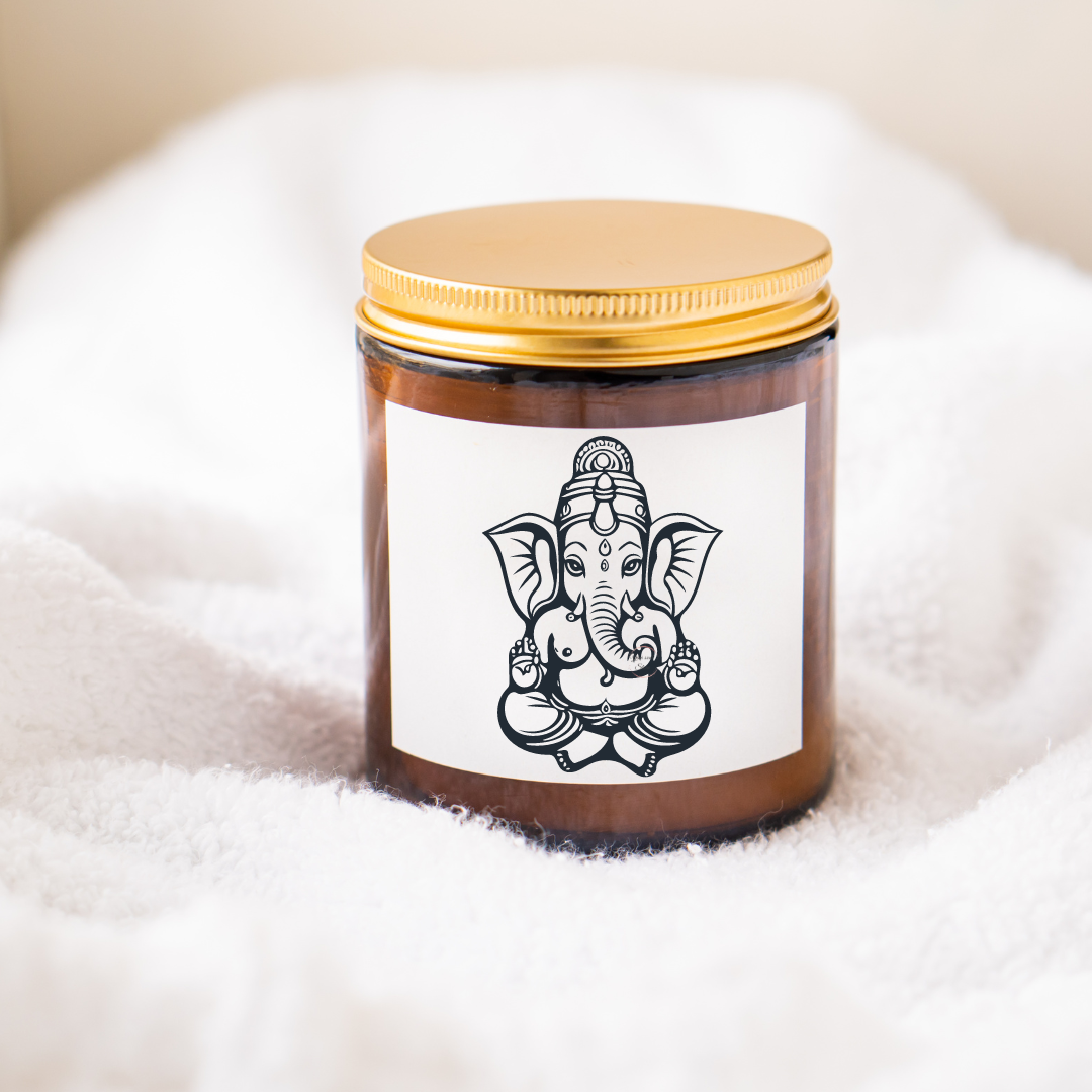 "Divine Blessings: Light Up Your Home with Our Lord Ganesha Candle 8 0z